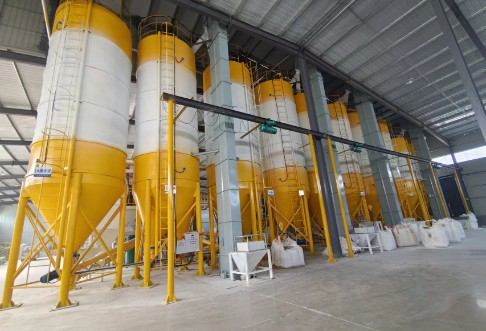 Dry mortar powder silos connected to a production system