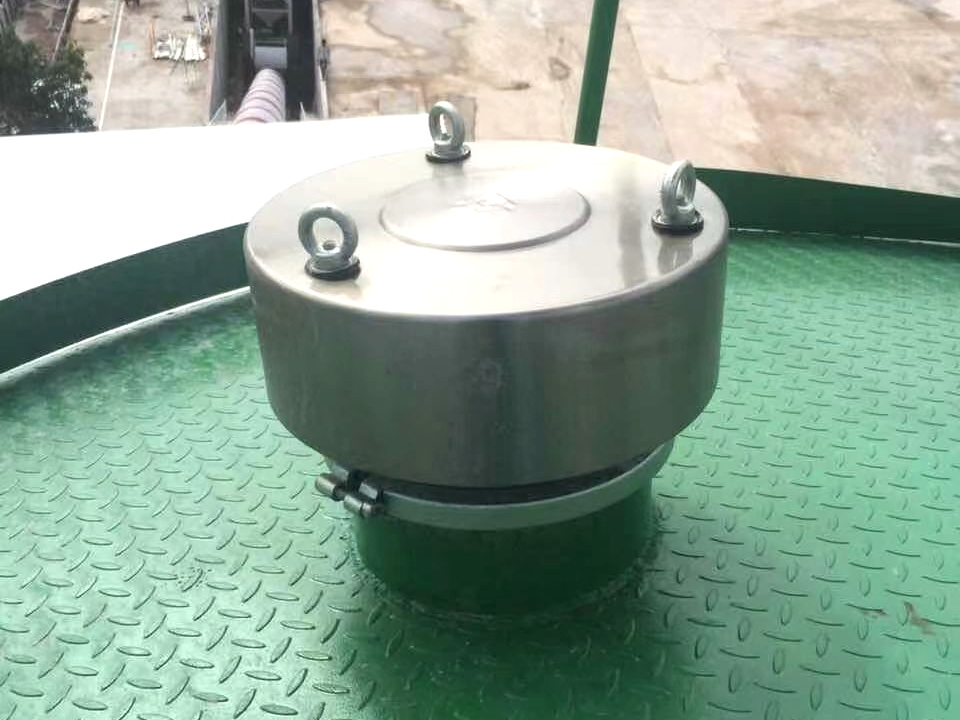 Pressure relief valve installed on top of a storage silo
